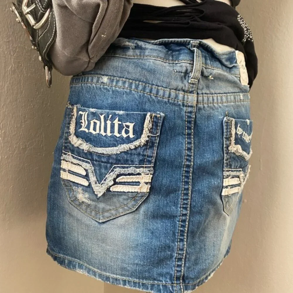 Mini denim skirt by Lolita. 🎸 - Picture 6 of 7